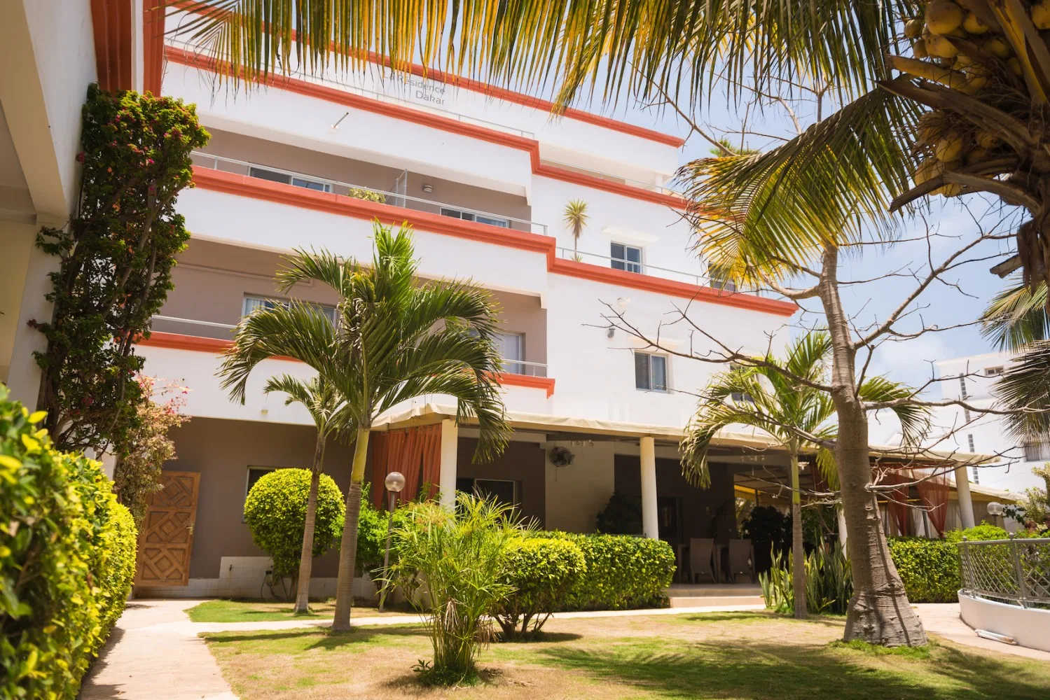 Tropical garden courtyard at La Résidence Dakar